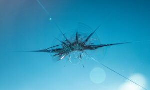 chip in windshield glass cracking and spreading and needing windshield chip repair Houston