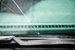 Cracked windshield before mobile windshield repair in Houston
